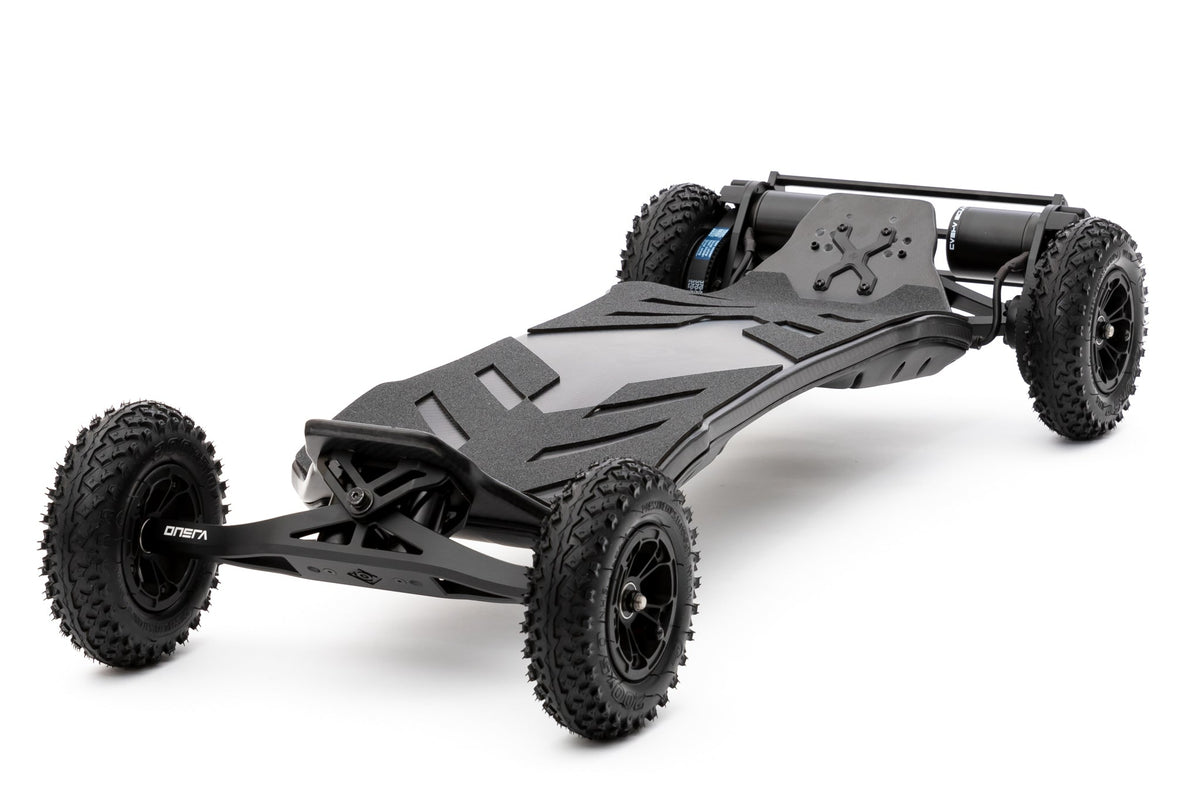Black ONSRA VELAR all-terrain electric skateboard with pneumatic tires, studio side view