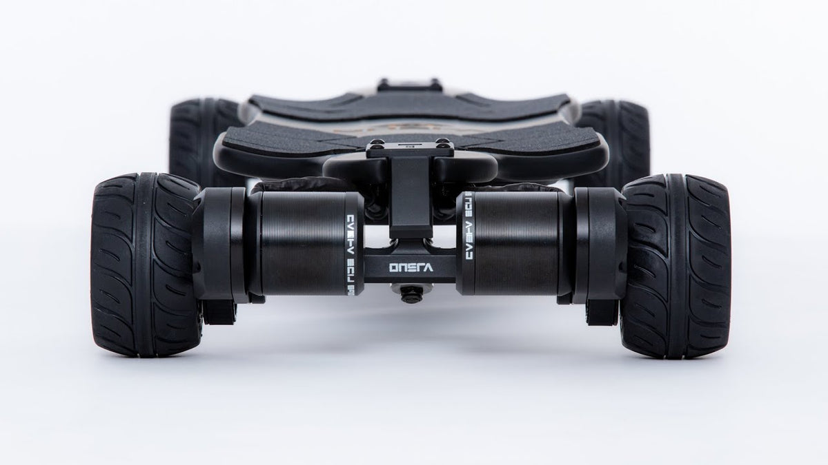Rear view of the ONSRA BLACK Carve 3 electric skateboard with its dual motors, which brake regeneratively