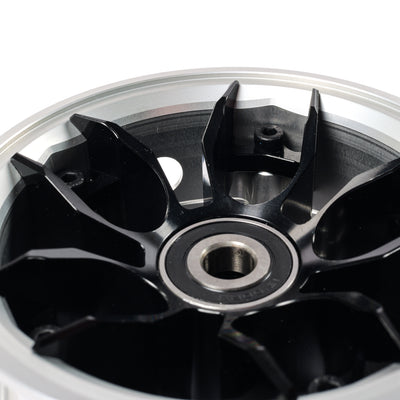 Close-up of black CNC wheel hub center with reinforced spoke design for high power electric skateboards