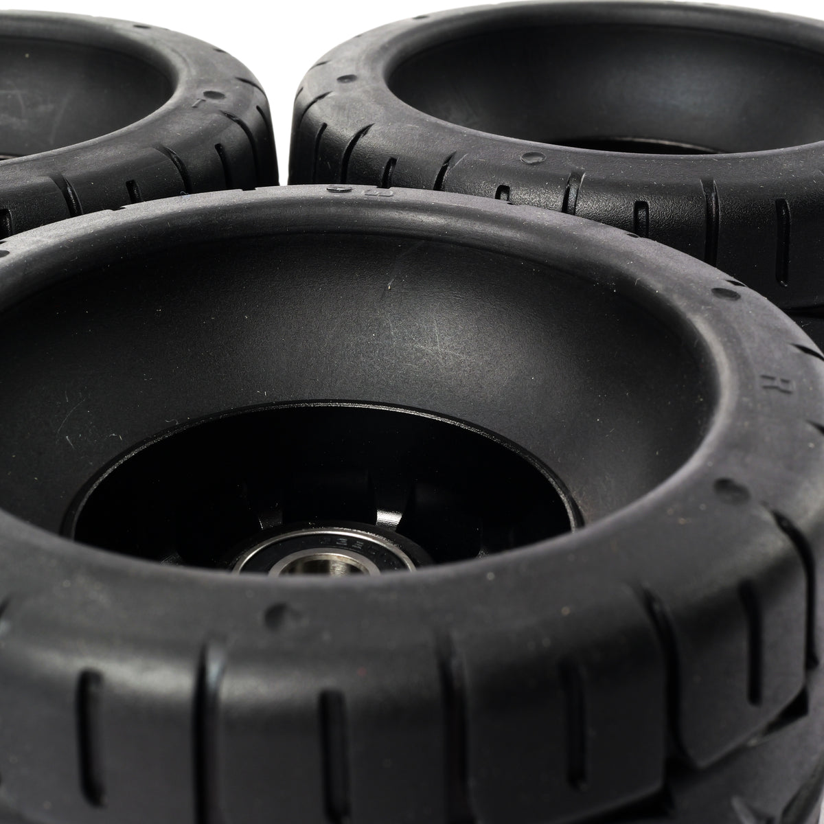 Onsra 115mm x 65mm 70A black rubber electric skateboard wheel with street tread pattern
